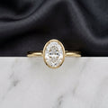 Oval Cut Bezel Solitaire Engagement Ring