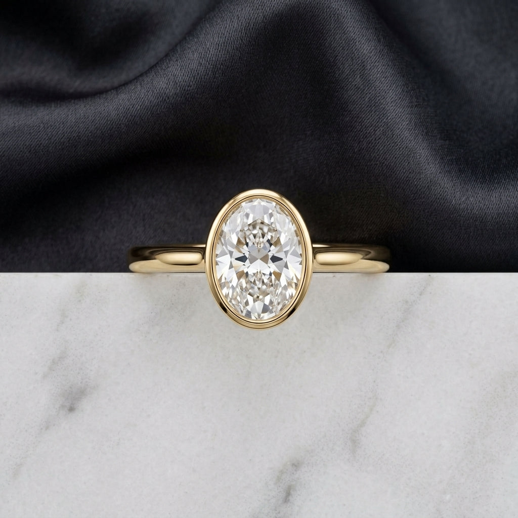 Oval Cut Bezel Solitaire Engagement Ring