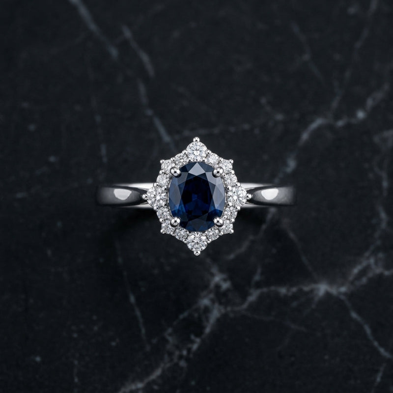Oval blue sapphire halo ring